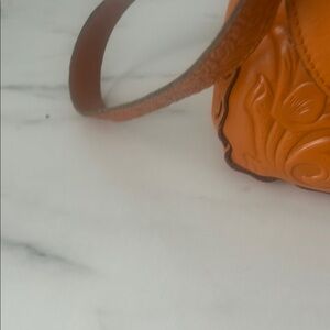 Patricia Nash Orange and Gold Crossbody Bag with Textured Floral Design